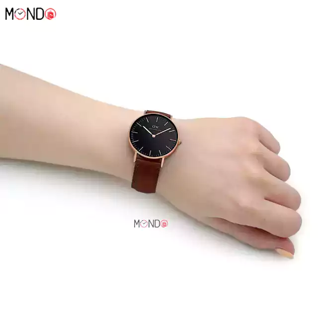 نمای دست ساعت مردانه/زنانه دنیل ولینگتون مدل DW00100136 بند چرم قهوه ای